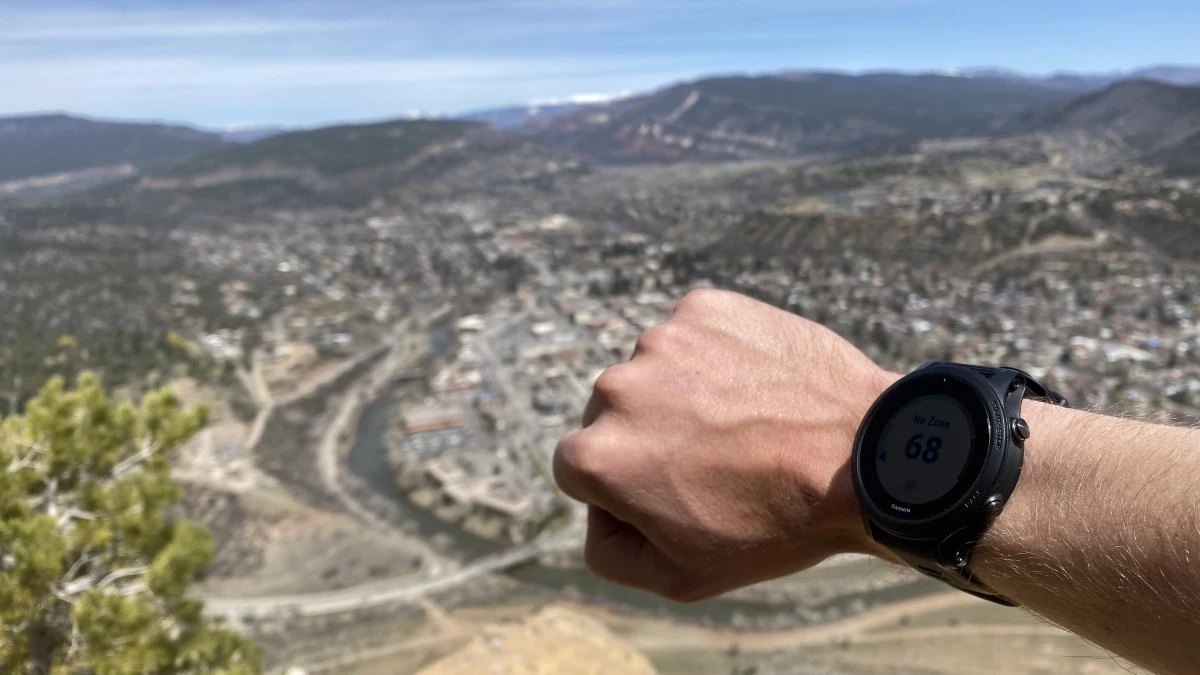 The Garmin Forerunner 945 high above a mountain in Colorado